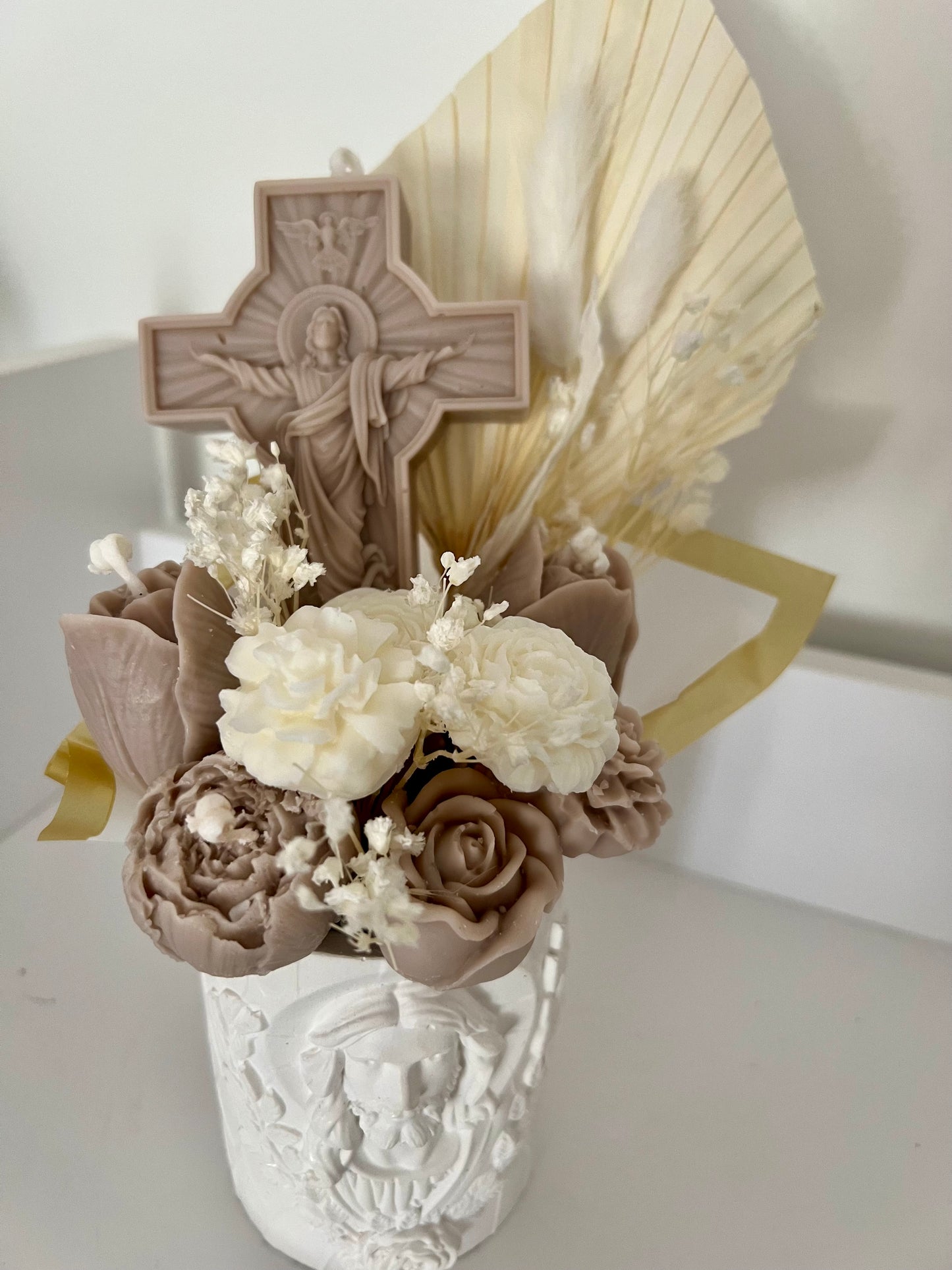 Religious gifts vase with candle bouquet