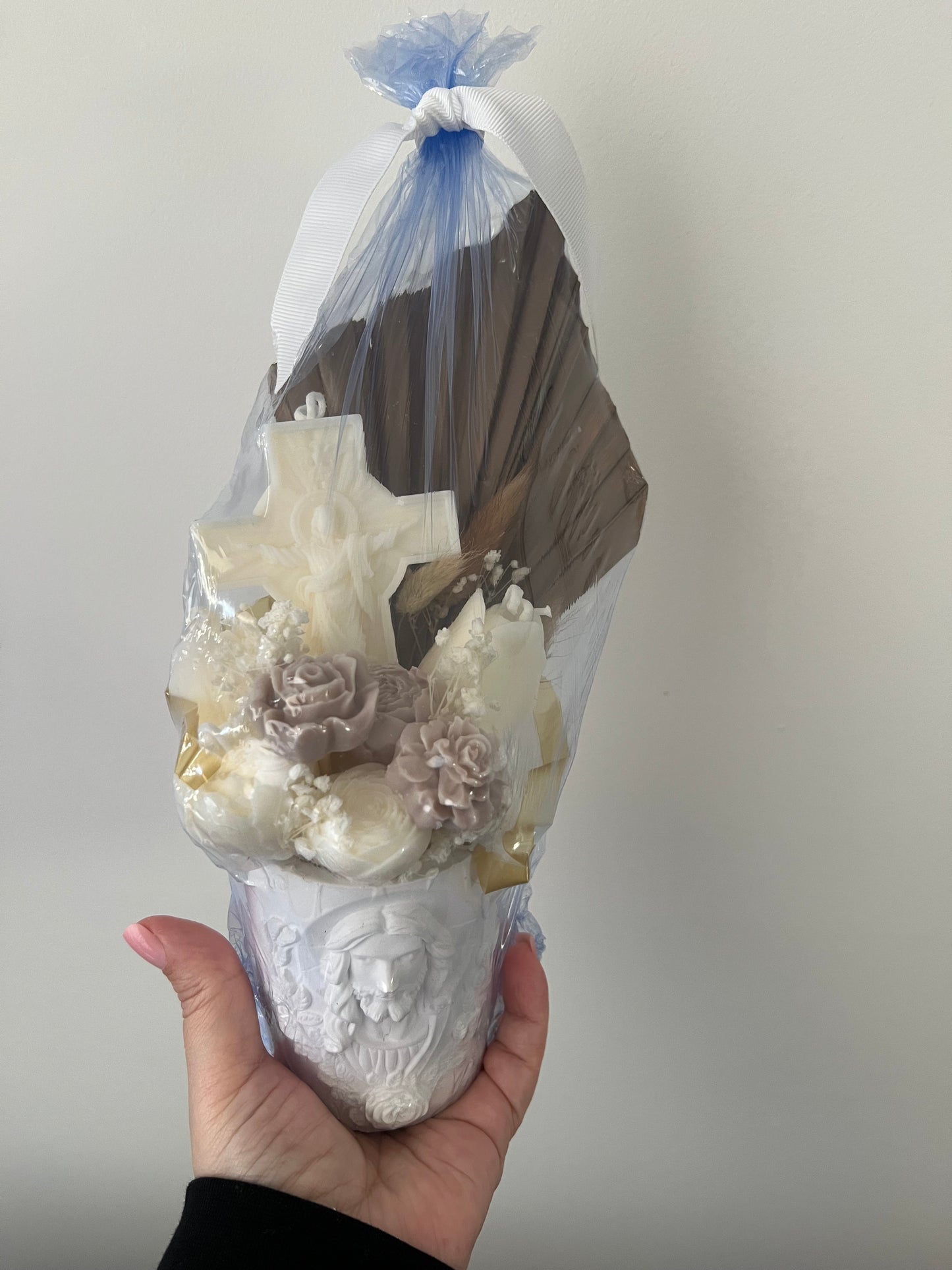 Religious gifts vase with candle bouquet