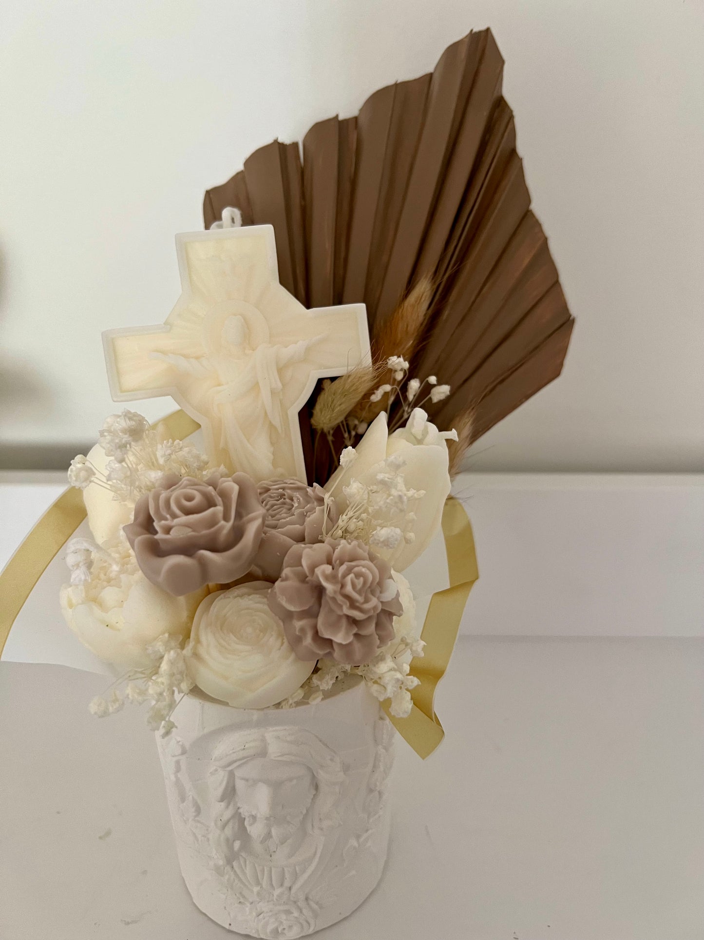 Religious gifts vase with candle bouquet