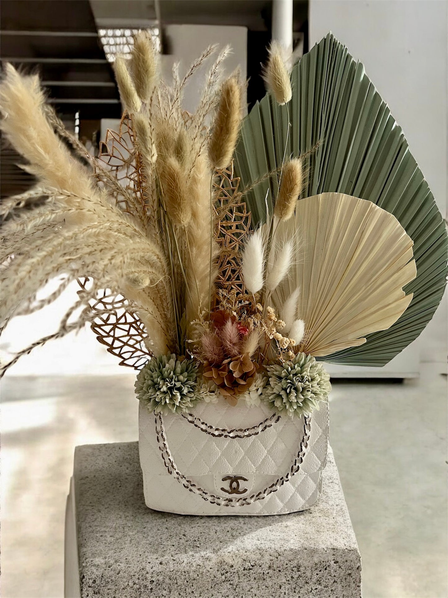 Designer inspired handbag vase with flowers
