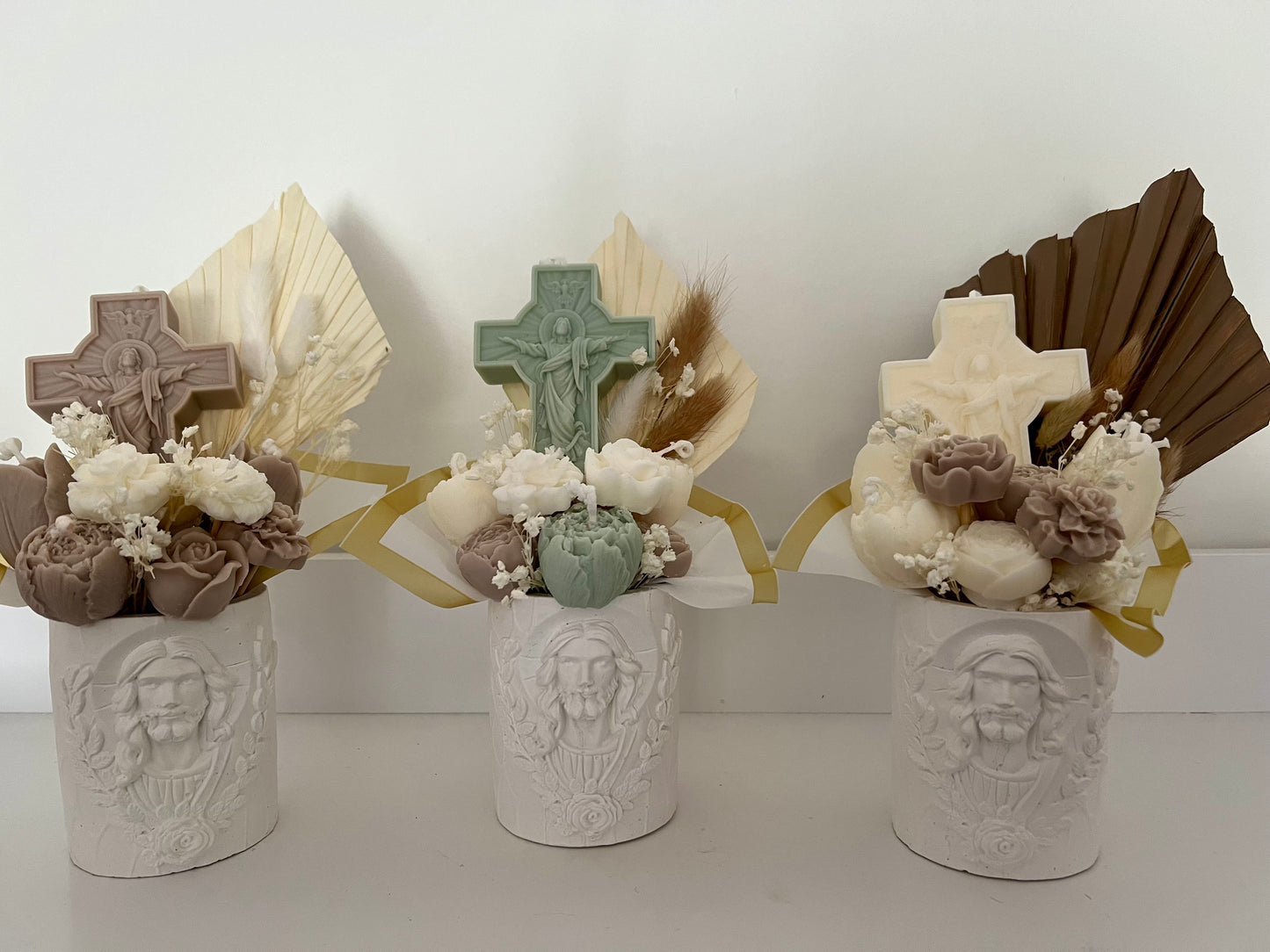 Religious gifts vase with candle bouquet