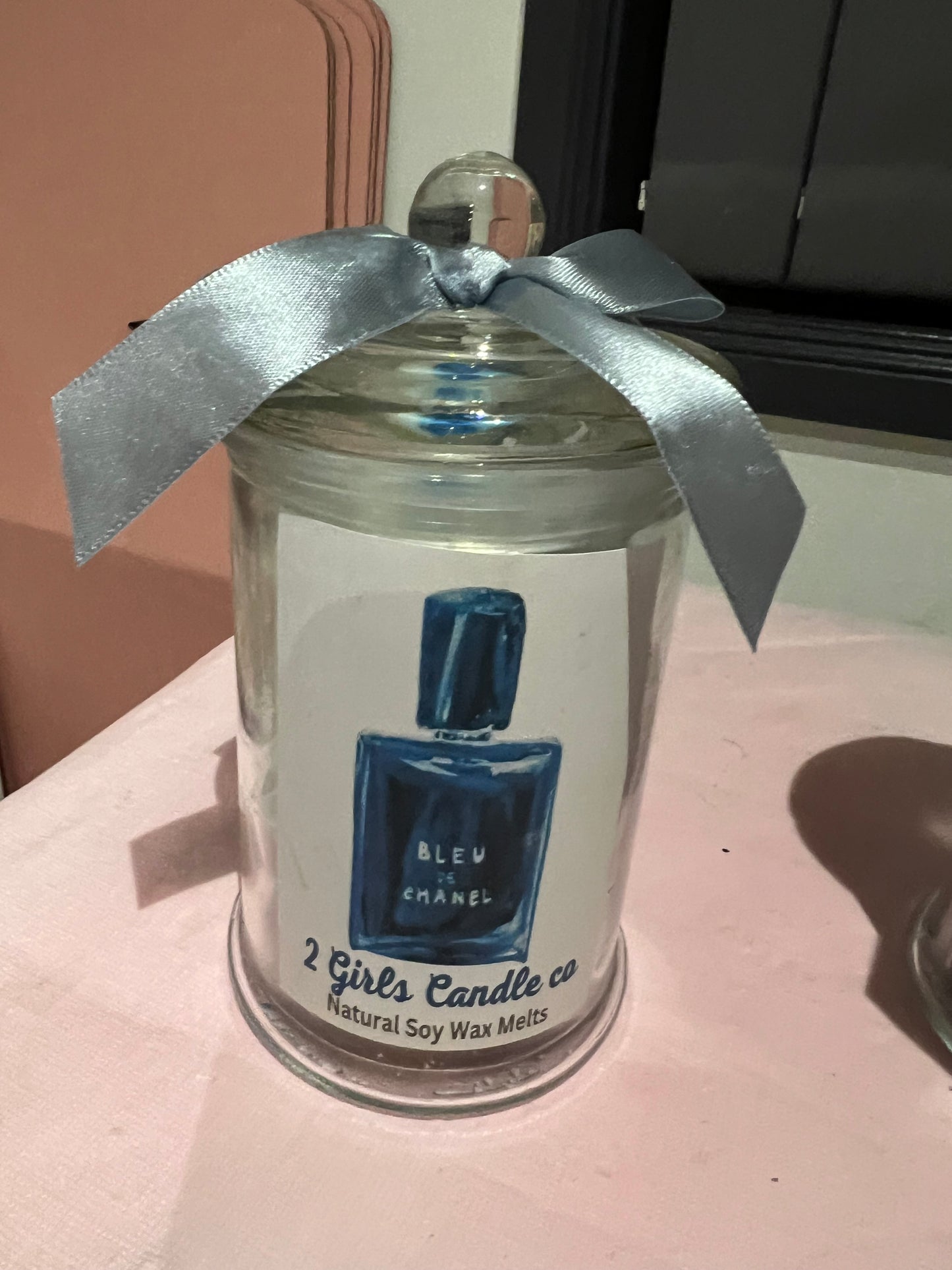 Designer inspired soy wax melts in a bottle