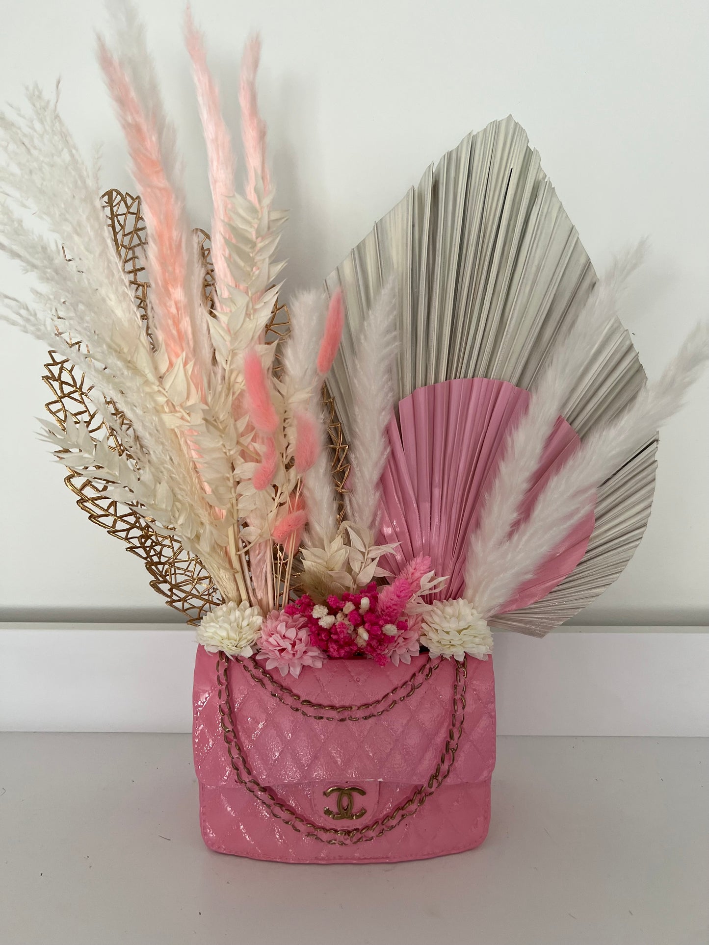 Designer inspired handbag vase with flowers