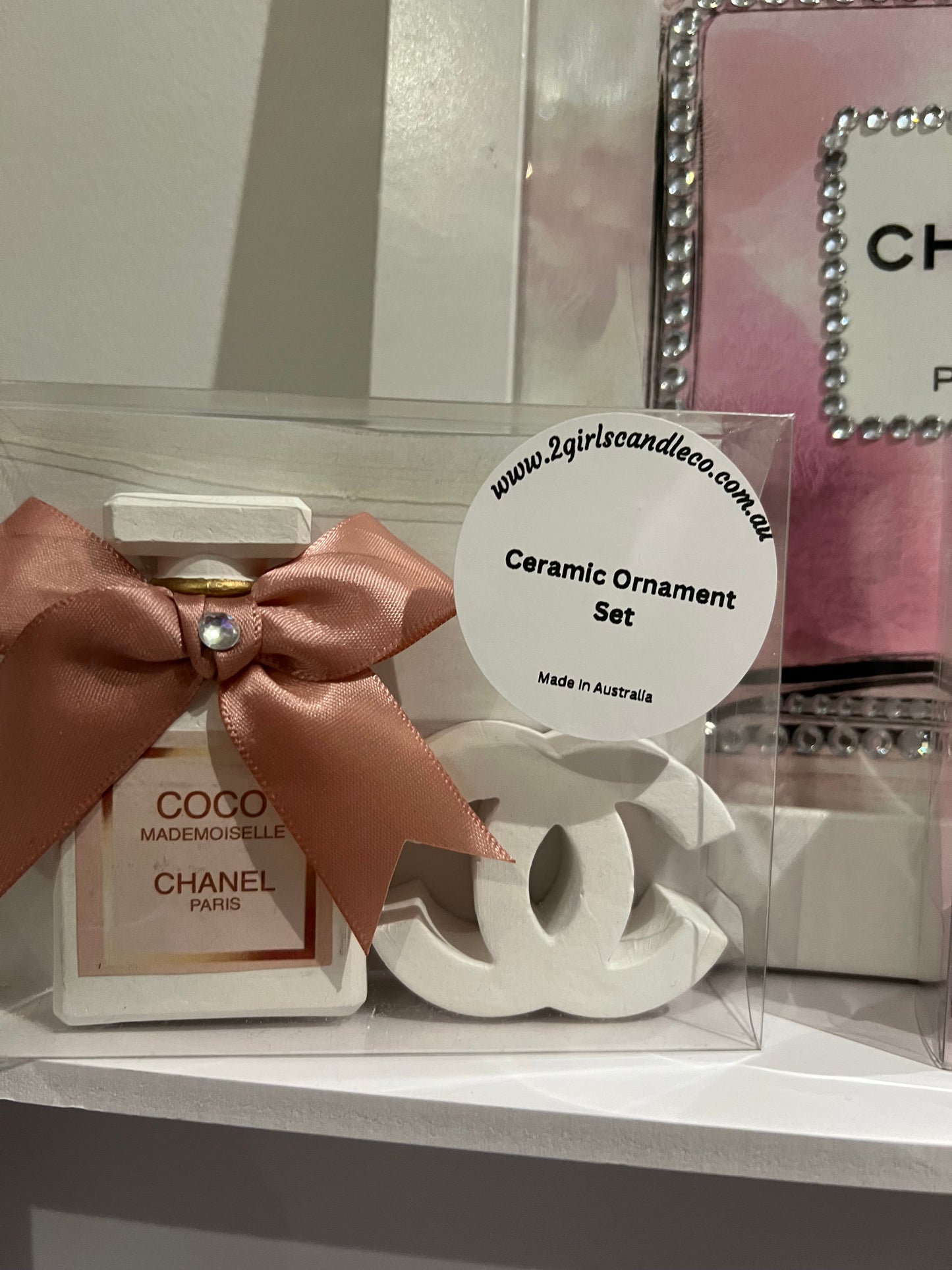 Ceramic perfume bottle & logo