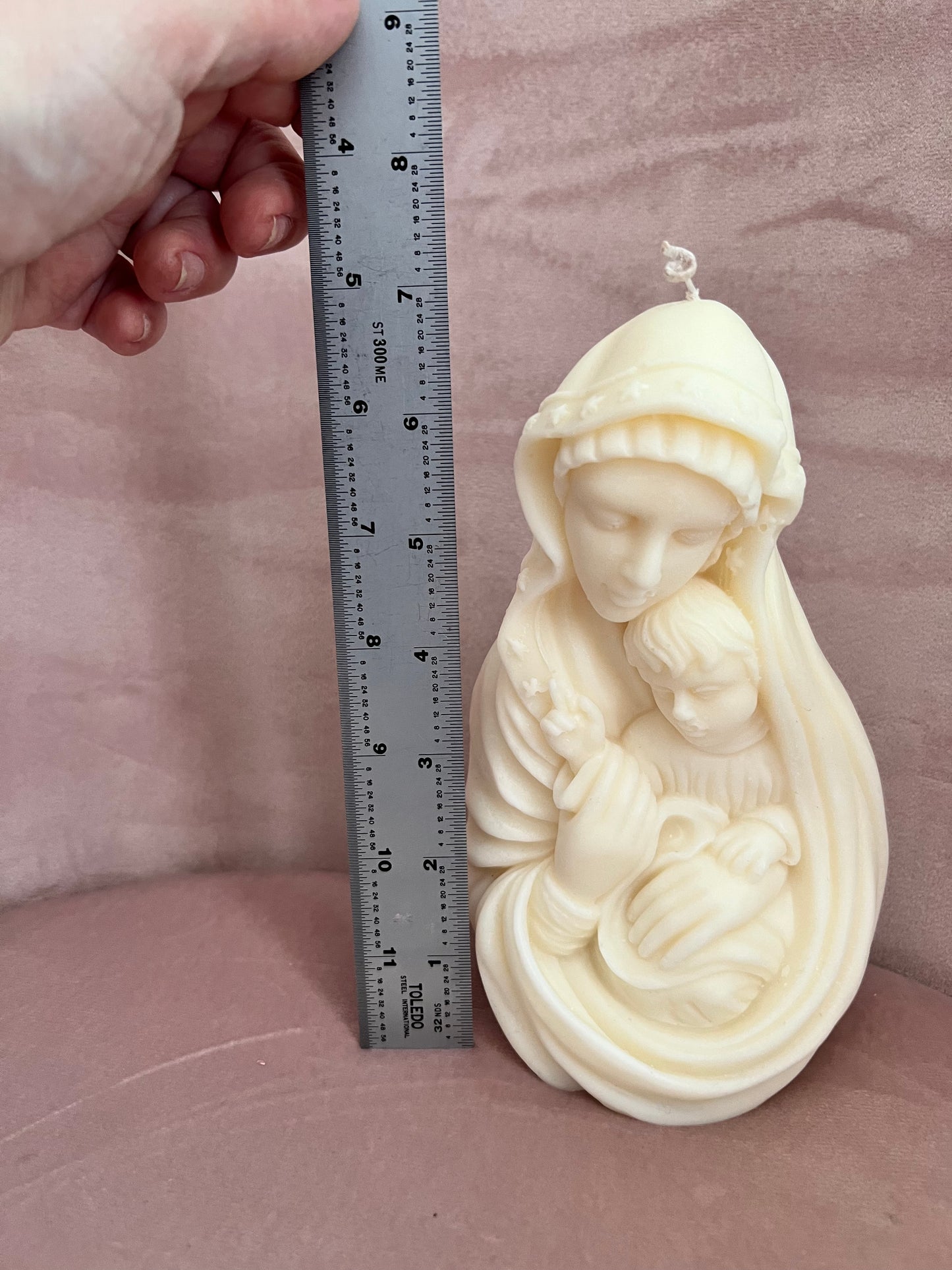 Mary with baby Jesus candle