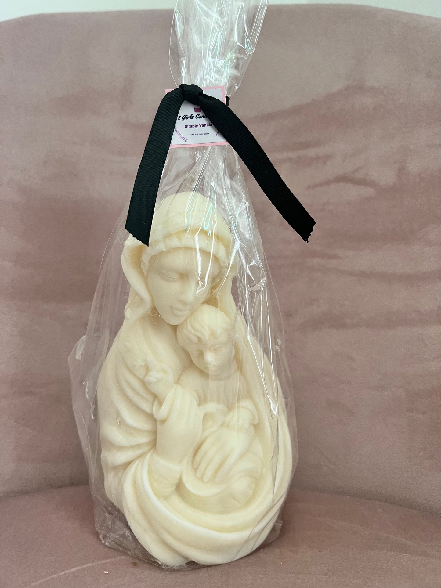 Mary with baby Jesus candle